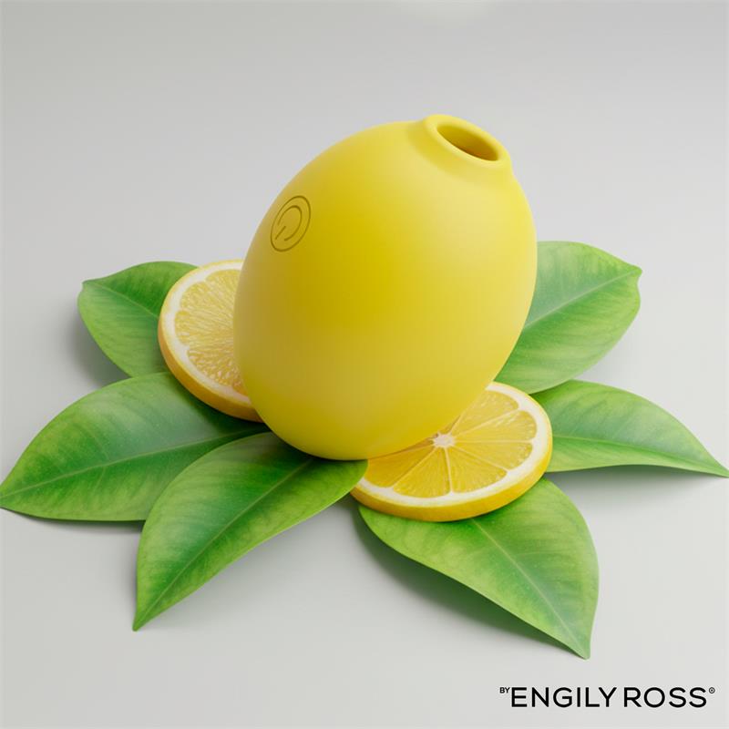 Stimulator klitorisa - Engily Ross Lemon - prikazan na zelenom lišću uz dvije kriške limuna