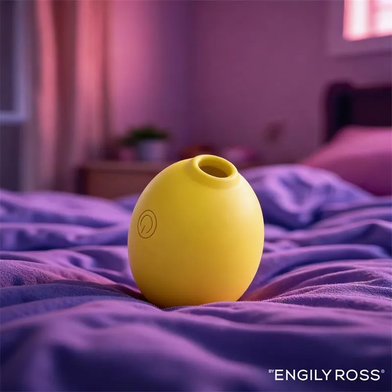 Stimulator klitorisa - Engily Ross Lemon - prikazan ljubičastoj satenskoj plahti